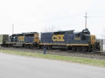 CSX road slug #2229 and slug mother #6403 creep east at head end of rail pickup train 